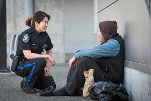 Officer with a Homeless Person